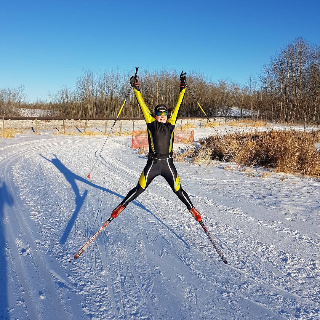 Nordic skier jumping in a star shape